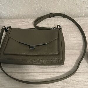 Olive Green Crossbody two predicated slots on the inside worn a few times